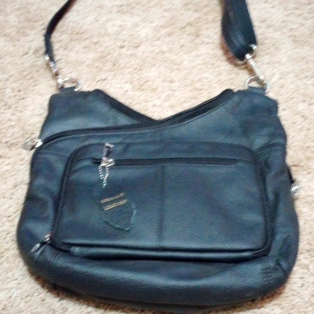 Roma genuine leather concealed carry purse.